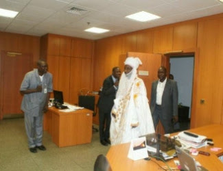 Central Bank Gov. Lamido Sanusi Resumes Work In Chieftaincy Regalia! 8