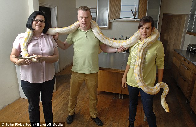 Girl shares home with 17ft-long albino python say's she's family 3