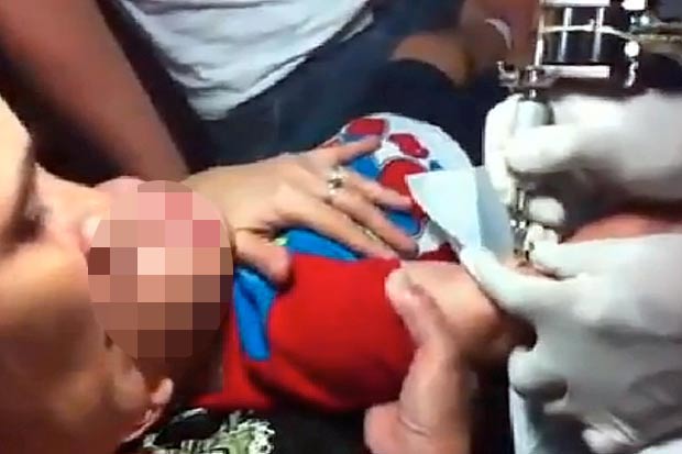 VIDEO: Mother Forces Little Son To Have A Tattoo 1