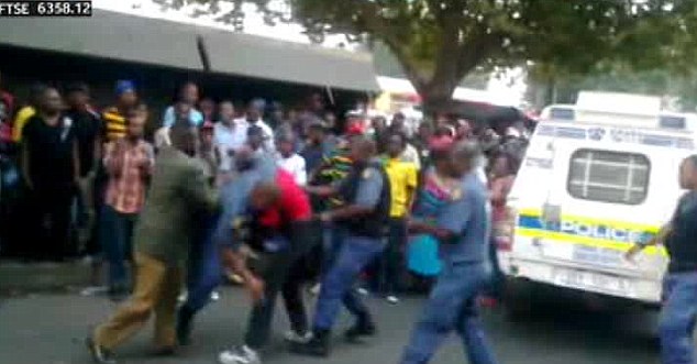 WTH: South African Police Chain A Man To A Van And Drag Him Round The City, 2 Hours Later He Died(VIDEO) 2