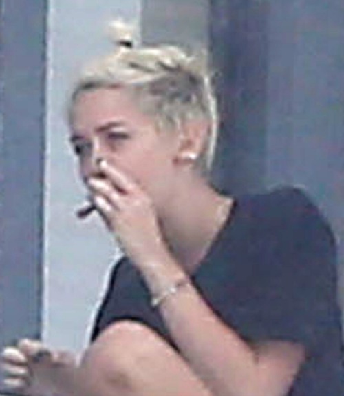 PHOTO: Miley Cyrus Photographed Smoking Pot 20