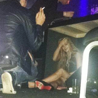 Lindsay Lohan Snapped Drunk And Under The Table In Brazil 3