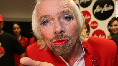 Billionaire Richard Branson Dresses As Sexy Air Hostess After Losing Formula 1 Bet 7
