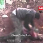 Video Of Syrian Rebel Leader Hacking A Dead Soilder's Body And Eating His Heart And Other Organs 2