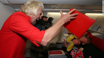 Billionaire Richard Branson Dresses As Sexy Air Hostess After Losing Formula 1 Bet 13