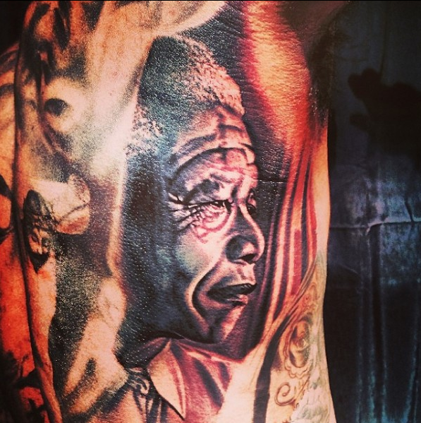 PHOTO: Rapper ''The Game'' honours Nelson Mandela with a huge tattoo 1