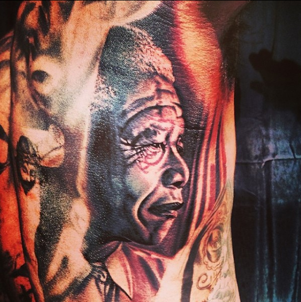PHOTO: Rapper ''The Game'' honours Nelson Mandela with a huge tattoo 11
