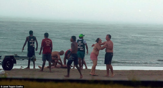 PHOTOS: Woman struck dead by lightning at the beach, in front of her family 4