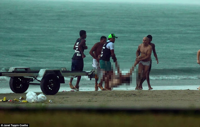 PHOTOS: Woman struck dead by lightning at the beach, in front of her family 3