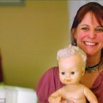 MADNESS: This 48 Year Old Woman Is Obsessed With Her Doll And Takes It Wherever She Goes 11
