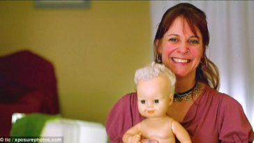 MADNESS: This 48 Year Old Woman Is Obsessed With Her Doll And Takes It Wherever She Goes 1