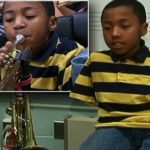 10 year old boy born without any arms masters how to play the trumpet with his TOES 1