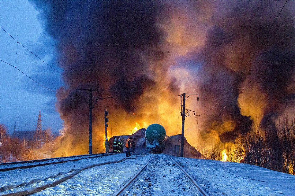 Train carrying gas containers explodes as it travels through Russia, sparking fears of terror attack 18
