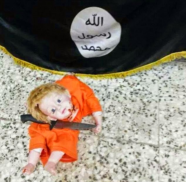 Child Jihadist Re-enacts Beheading Of American Journalist James Foley By Executing A Doll 3