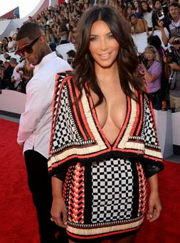Usher ‘caught’ checking out Kim Kardashian’s behind on red carpet