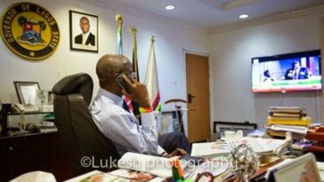 PHOTO Of Governor Fashola in His Office, Watching As INEC Announces Election Results 3
