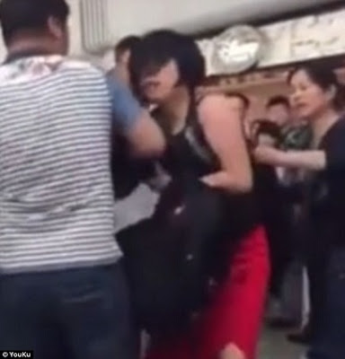 Angry Wife Disgraces Husband's Mistress After She Caught Both Of Them [PHOTOS + VIDEO] 2
