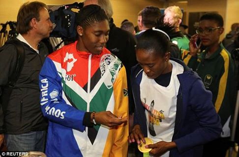 South African Runner Caster Semenya Returns Home, Gives Her Gold Medal To Her Wife [PHOTO] 34