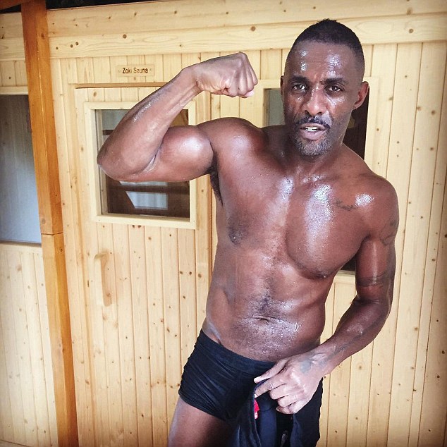 Idris Elba shares sweaty shirtless snap in just his pants as he prepares for his first boxing match 24