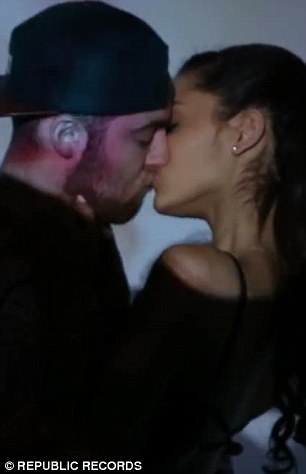 Sealed with a kiss! Ariana Grande confirms romance with rapper Mac Miller with PDA display on sushi date 1