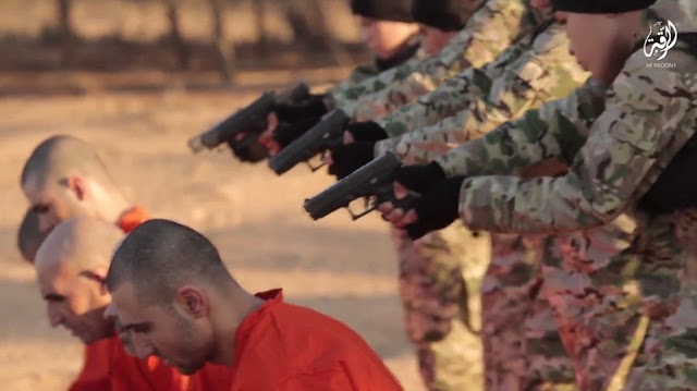 British child appear in new video shooting a prisoner in the head in Syria 16