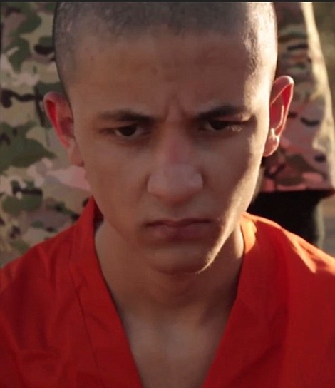 British child appear in new video shooting a prisoner in the head in Syria 15