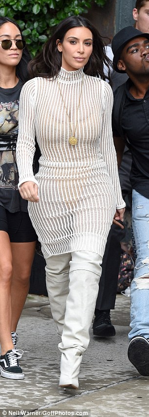 Kylie Jenner upstages Kim Kardashian by putting her under-boob on show at Kanye's fashion show 6