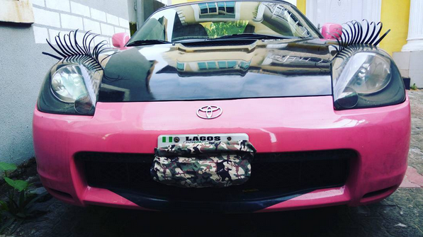 Actress Cossy Ojiakor and her boobs pose in her pink Toyota Porsche [PHOTOS] 2