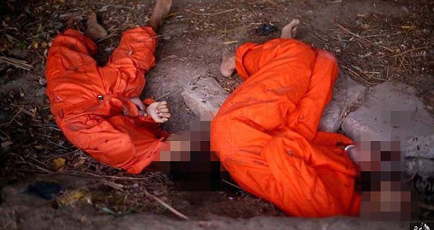 ISIS force 2 kids to shoot two prisoners in the head after accusing the men of being spies [PHOTOS] 3