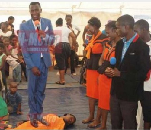 Pastor Uses Spiritual Power to Make Church Members Sleep, Stands on their stomach (Photos) 1