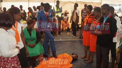 Pastor Uses Spiritual Power to Make Church Members Sleep, Stands on their stomach (Photos) 2