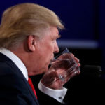 Republican US presidential nominee Trump sips water during the third and final debate with Democra 1