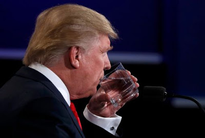 Republican US presidential nominee Trump sips water during the third and final debate with Democra 1