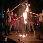 hillary clinton supporters burn flag