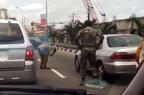 Soldier Orders Man Out Of Car To Do Frog Jump In Broad Daylight For Obstructing His Movement - Watch Video 13