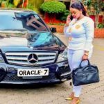 This Sexy Female Pastor Is The Sexiest Pastor In Africa, Her Security Detail And Luxury Cars Will Scare You - See Photos 7