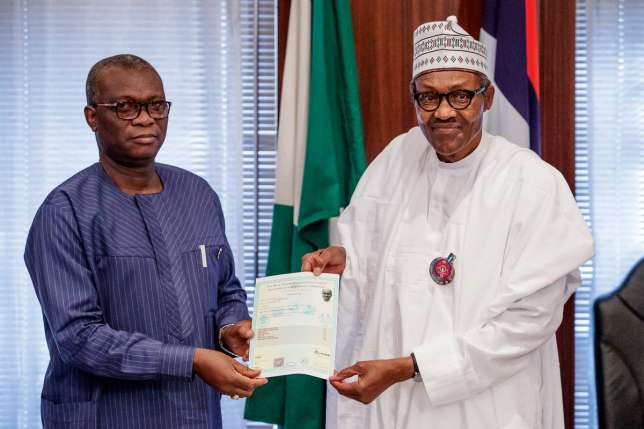 WAEC Presents Certificate To President Buhari, Critics Says The Examination Result Is 'Manufactured' 28