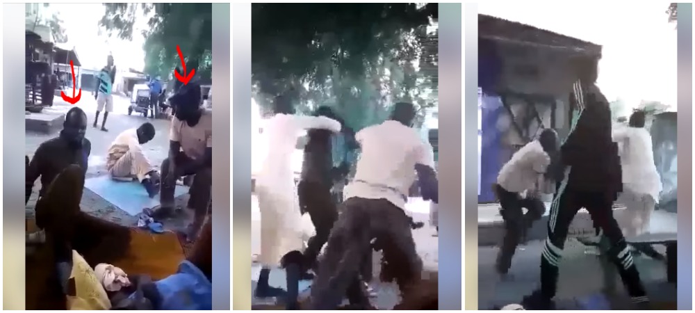Two Hausa Men Fight Each Other Publicly Over President Buhari - See Photos 17