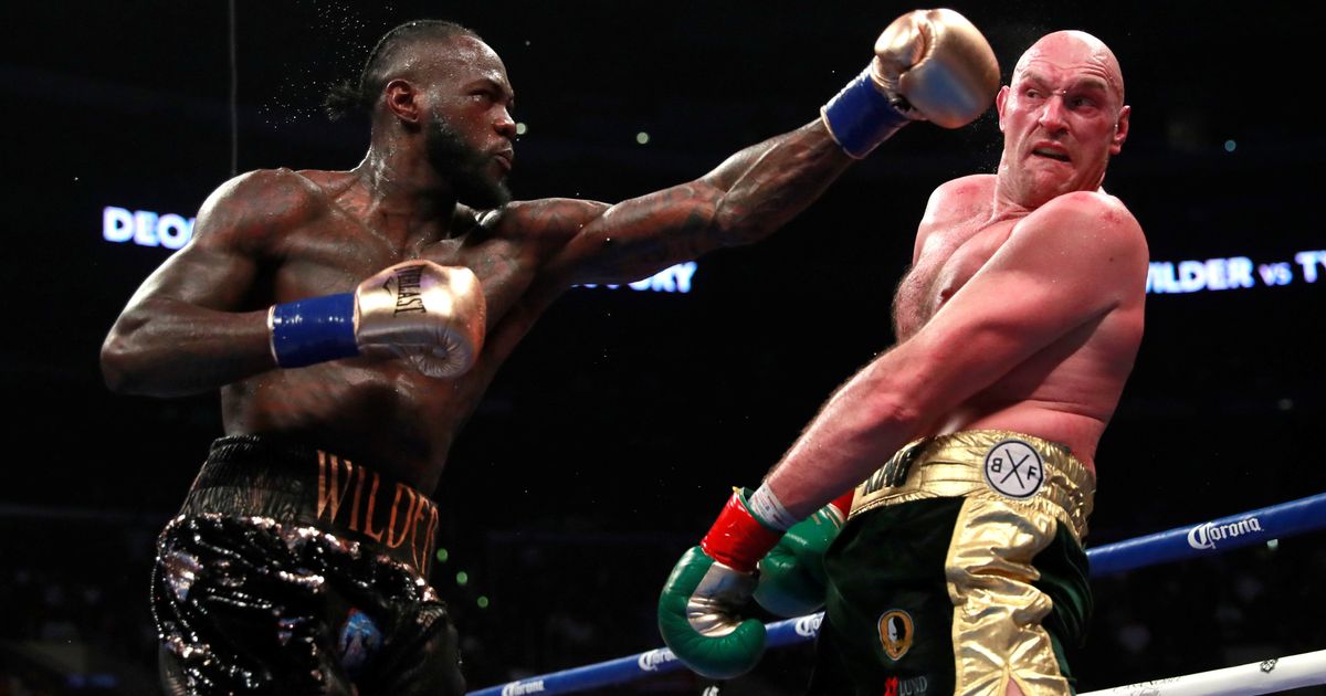 Tyson Fury And Deontay Wilder Fight For The WBC Heavyweight Title Declared Draw - See Photos 1