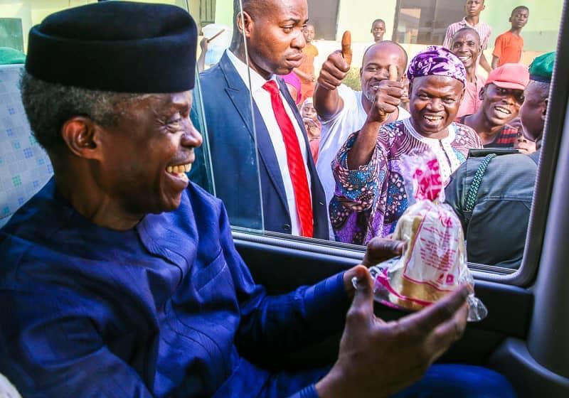 VP Osinbajo Excited After Man Breached Security To Give Him Loaf Of Bread In Abuja [Photos] 2