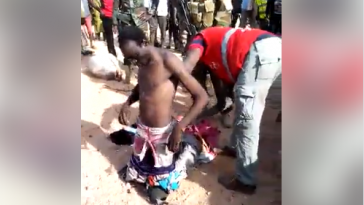 Boko Haram Terrorist Who Disguised As Woman Was Caught And Stripped By Soldiers [Photos] 3