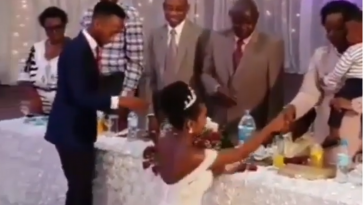Outrage As Bride Walks On Her Kneels At Wedding Reception To Greet Her Guests [Video] 2