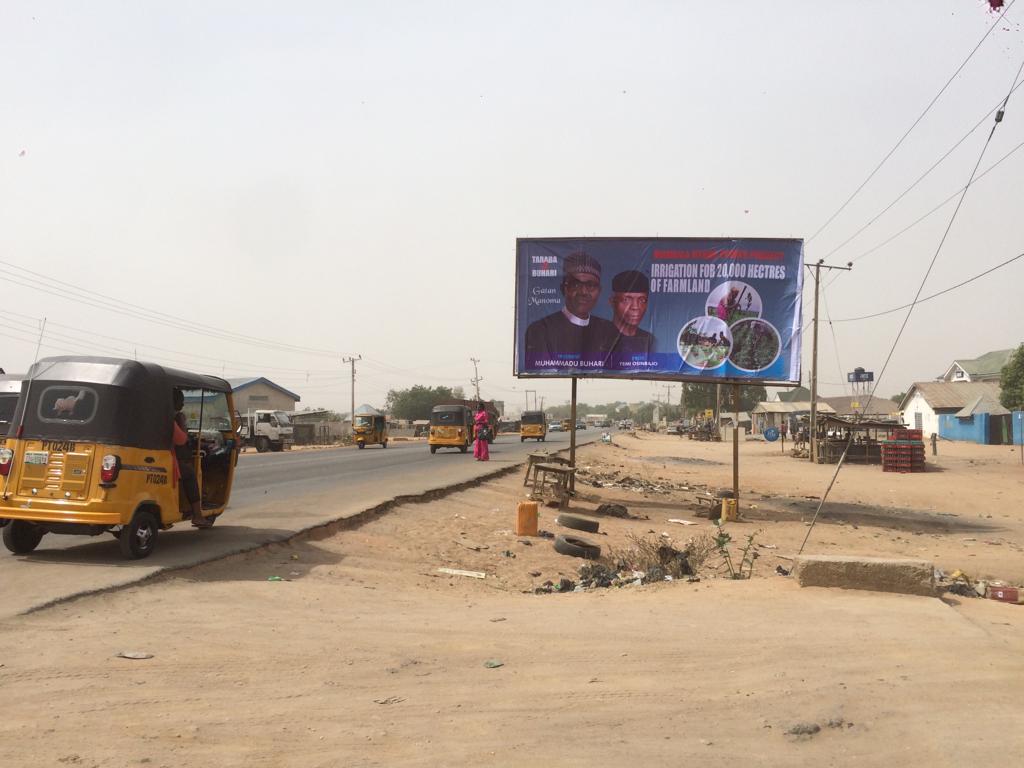Thugs Destroys President Buhari's Billboard Posters Ahead Of His Campaign Rally In Taraba [Photos] 8