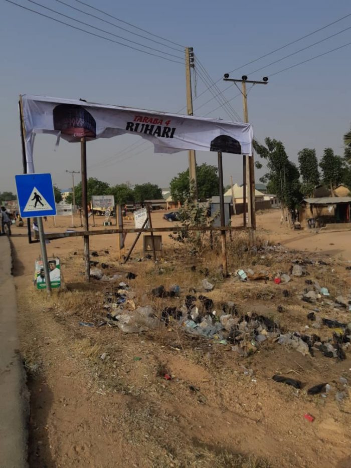 Thugs Destroys President Buhari's Billboard Posters Ahead Of His Campaign Rally In Taraba [Photos] 1