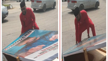 Banky W Spotted Picking Up His Fallen Campaign Board In Lagos [Video] 4