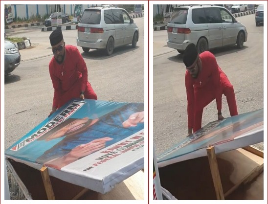 Banky W Spotted Picking Up His Fallen Campaign Board In Lagos [Video] 3